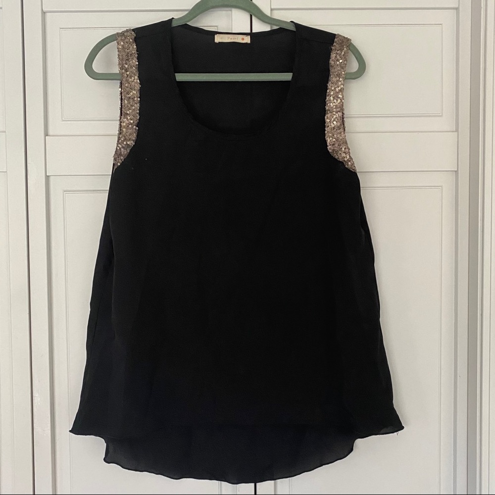 Sleeveless black top with lower back. Size L